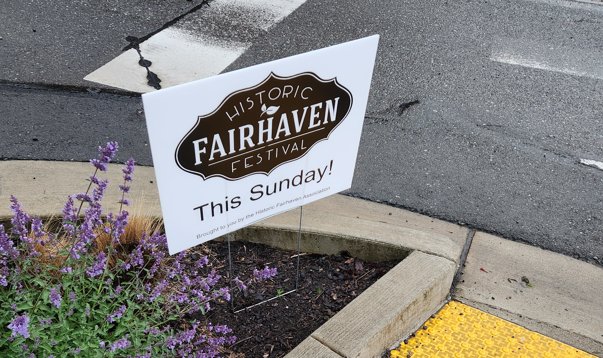 A sign for the Fairhaven Festival on Sunday, May 26, 2024. (Photo by Michael Grass / BhamBuyBus)