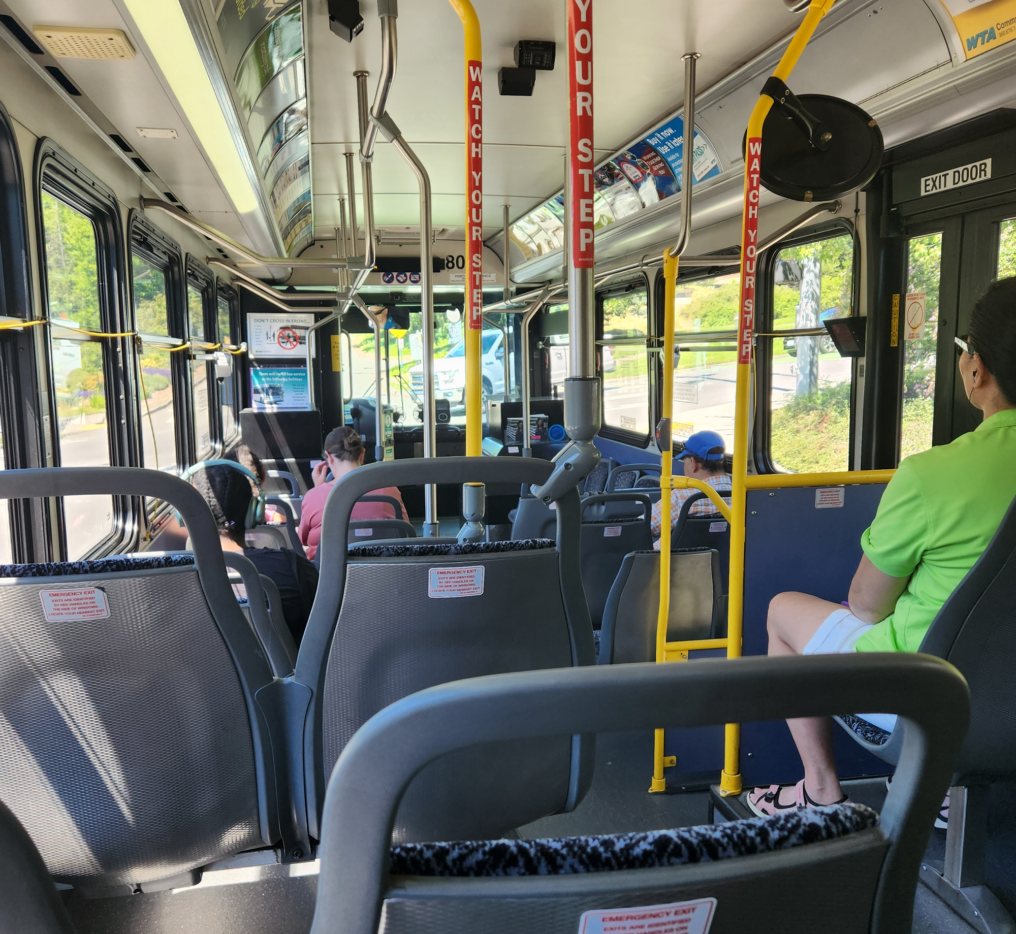 Passengers ride on a WTA bus.