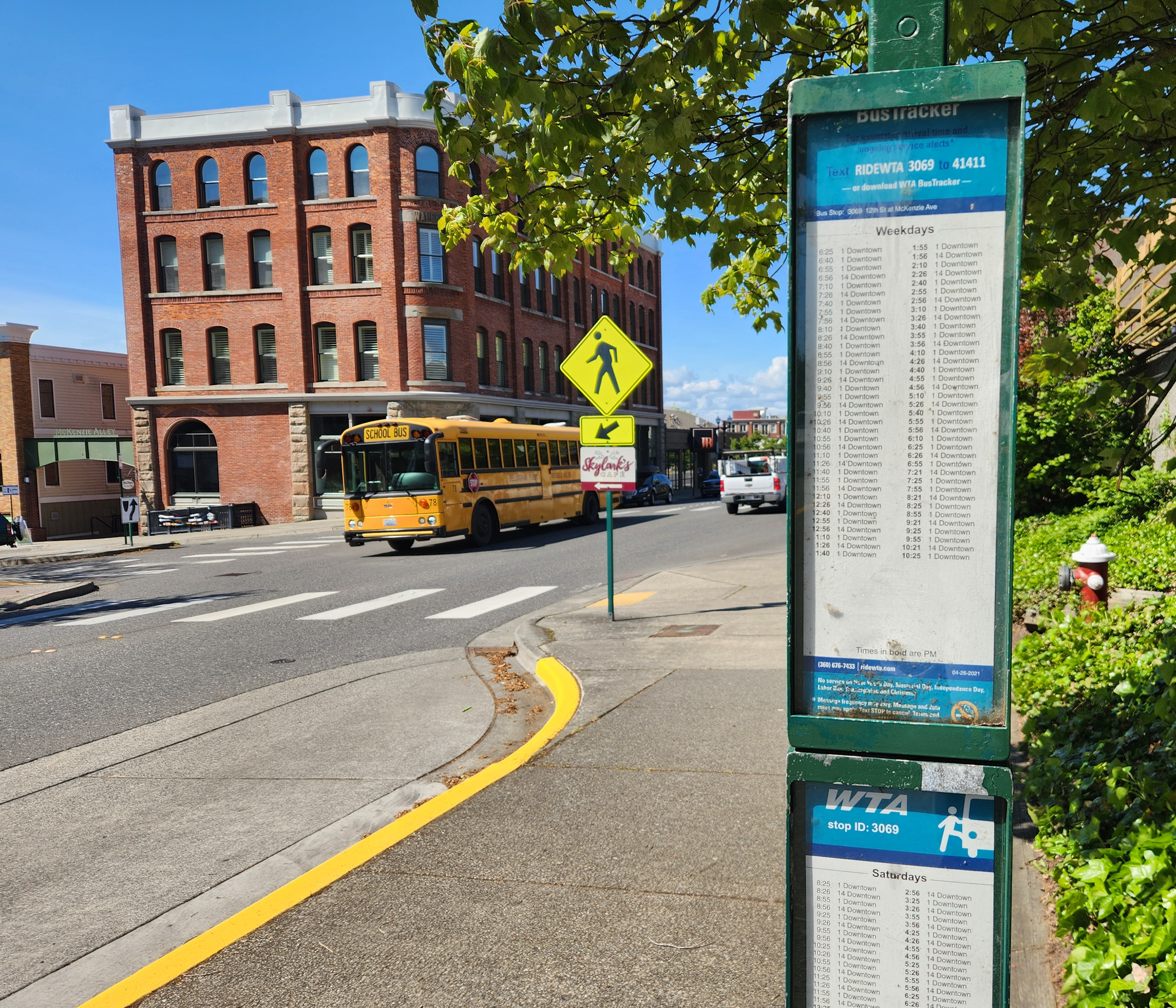 A bus schedule for Routes 1 and 14 at 12th Street & McKenzie Avenue in Fairhaven.