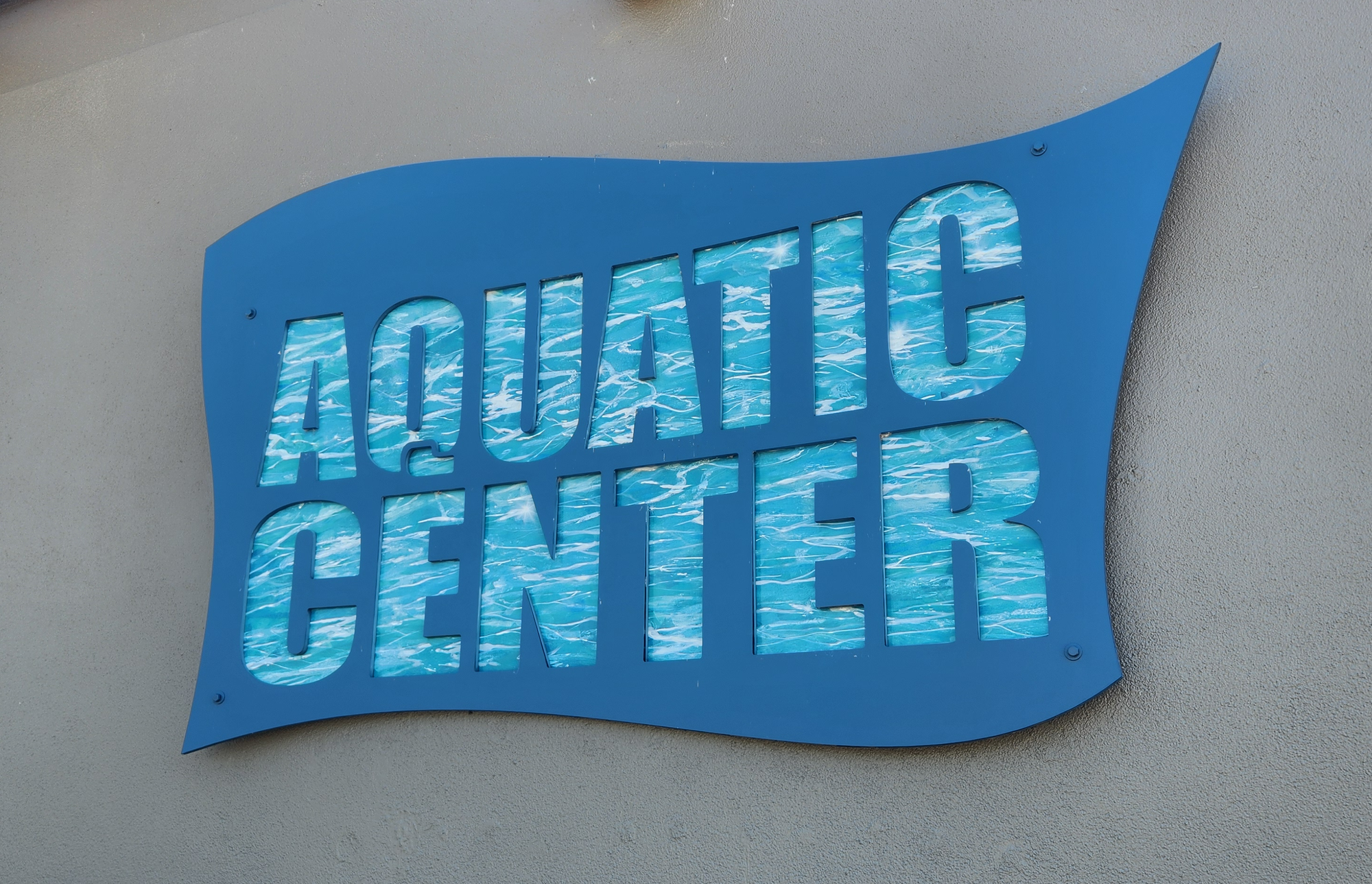 A sign that says "Aquatic Center."